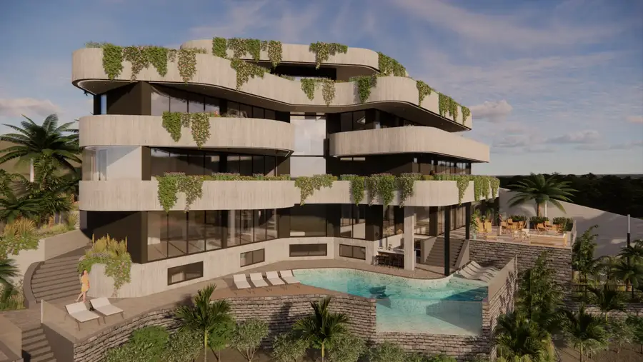 Terraços do hotel com piscina e espreguiçadeiras