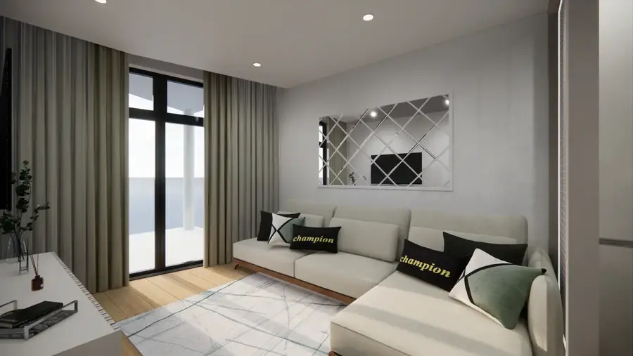 Sala de apartamento com sofá claro
