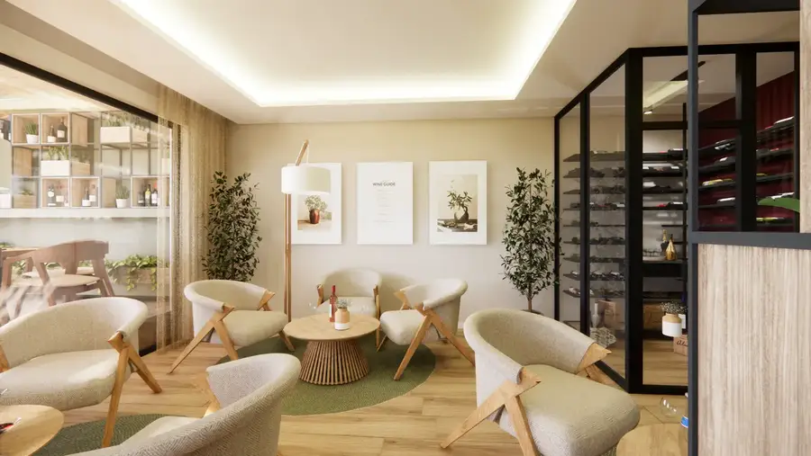 Zona lounge com cadeirões claros