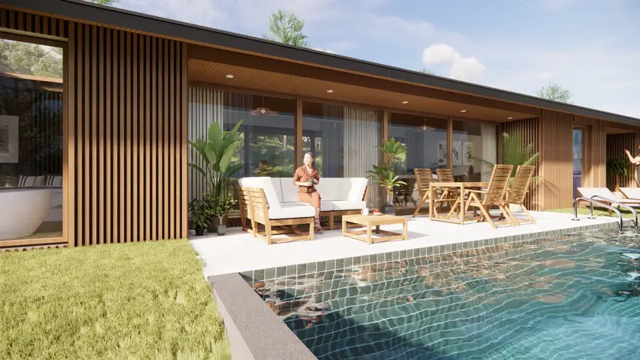 Exterior da moradia com piscina e revestimento ripado
